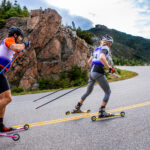 rollerskiers skiing up whiteface mountain